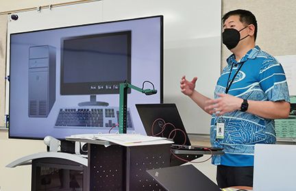 man teaching