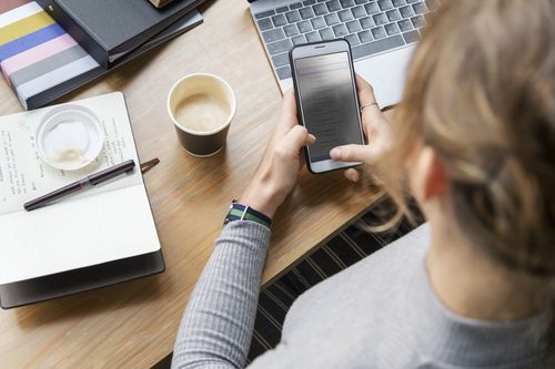 woman on smart phone