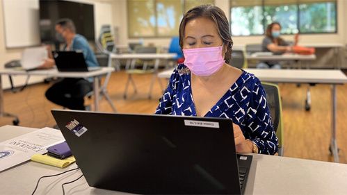 woman using laptop