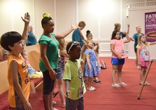 Smithfield Kids worshiping Jesus.