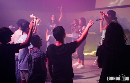 Students worshipping at RUSH.