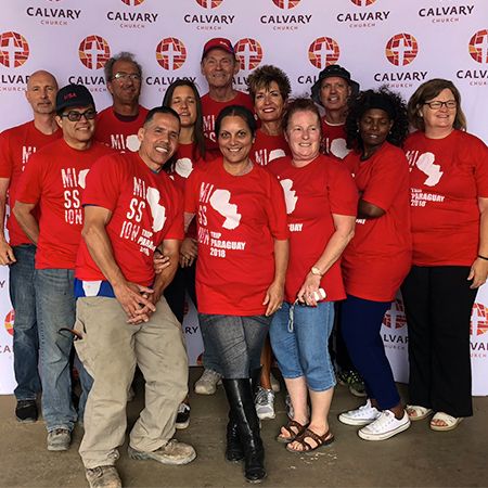 missions team in red shirts
