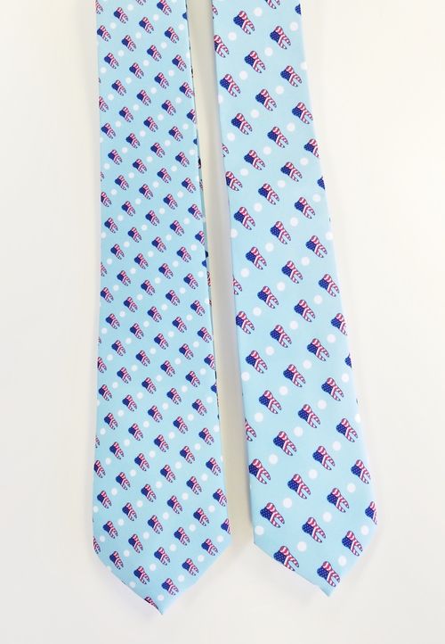 light blue necktie featuring tooth and usa flag