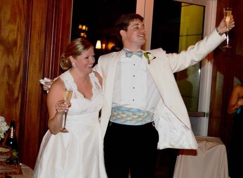 wedding bride and groom with custom cummerbund set for formal wedding